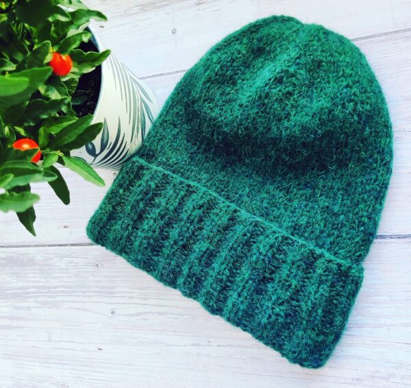 roheline kootud müts