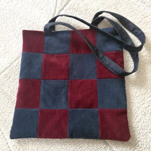 Punane ruuduline velvetist kott